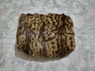 Antic escalfamans de pell clapada