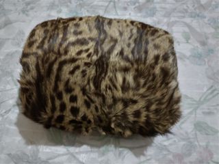 Antic escalfamans de pell clapada