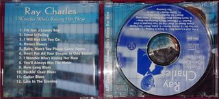 Ray Charles-I Wonder who's kissing her now.