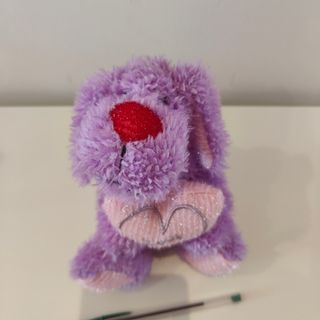 Peluche perro morado