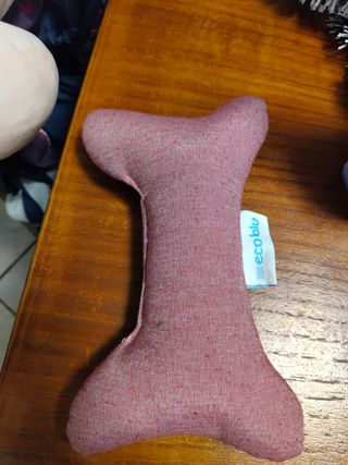 Peluche a forma di osso per cani