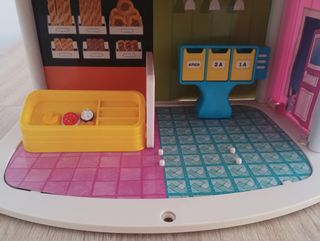 Edificio loco muñecas barriguitas