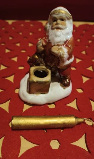 Babbo Natale di ceramica smaltata con candela