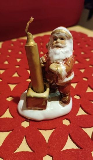 Babbo Natale di ceramica smaltata con candela