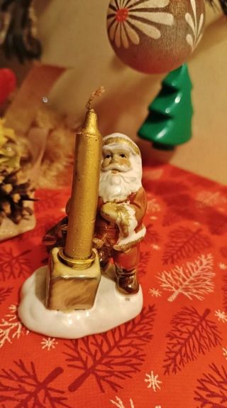 Babbo Natale di ceramica smaltata con candela