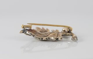 Broche antiguo en oro 18k y plata con diamantes