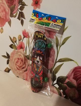 Mini monopatín para muñecas