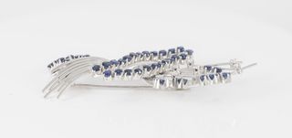 Broche vintage en oro 18k con zafiros y brillantes