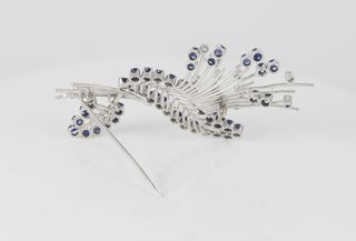 Broche vintage en oro 18k con zafiros y brillantes
