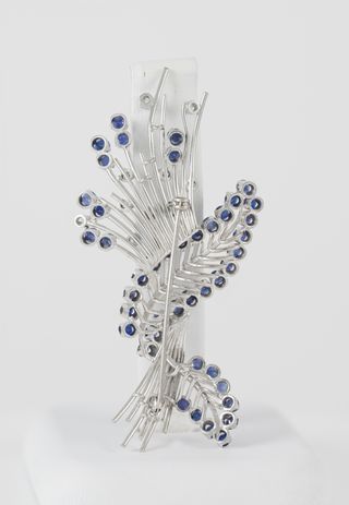 Broche vintage en oro 18k con zafiros y brillantes