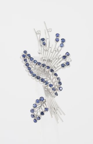 Broche vintage en oro 18k con zafiros y brillantes