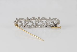 Broche antiguo en oro blanco y amarillo 18k