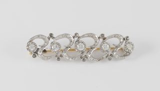 Broche antiguo en oro blanco y amarillo 18k