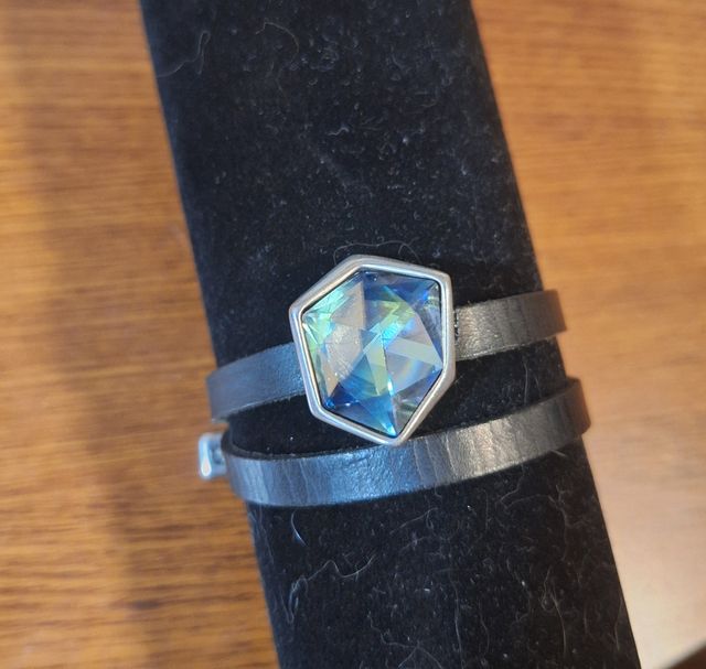 Anillo y pulsera de "uno de 50"