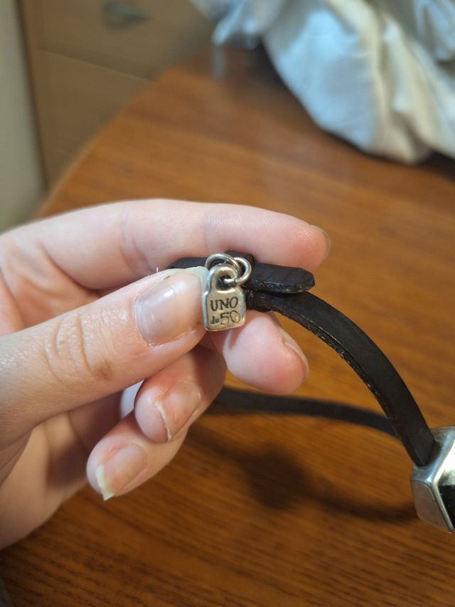 Anillo y pulsera de "uno de 50"