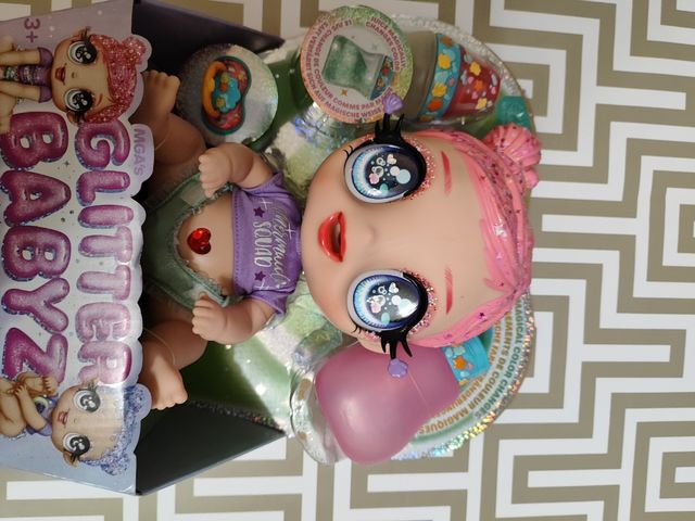 Muñeca glitter baby nueva con chupete y biberón