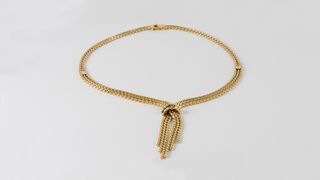 Conjunto de collar y pendientes en oro 18k