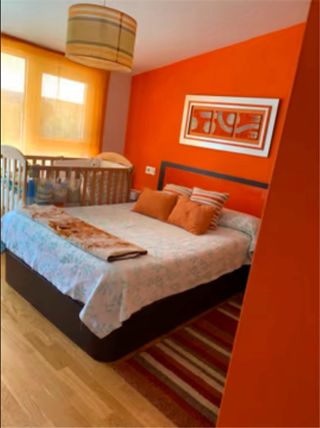 Habitación detalles naranjas