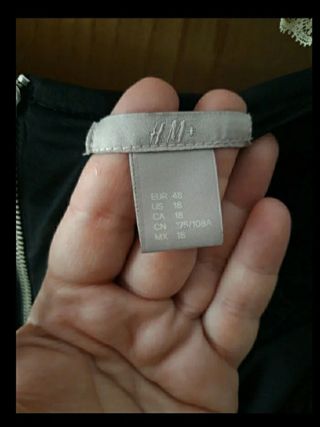 Abito nero con pizzo