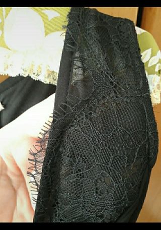 Abito nero con pizzo