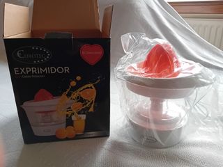 Exprimidor de cítricos de doble rotación