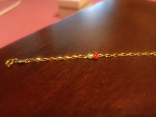 Pulsera oro dieciocho quilates cerezas.