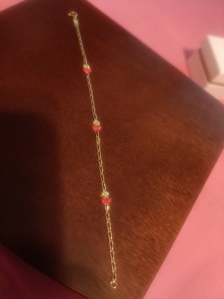 Pulsera oro dieciocho quilates cerezas.