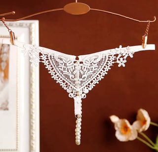 TALLA S.CON ETIQUETA.Tanguita sexy perlas 