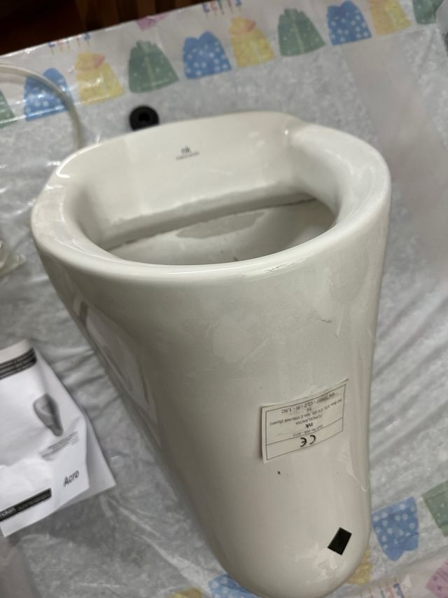 Urinario porcelanosa.