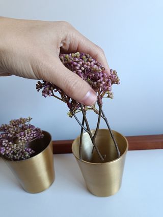 Set di vasi da fiori dorati