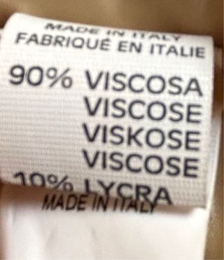 Cappotto trapuntato con collo in volpe