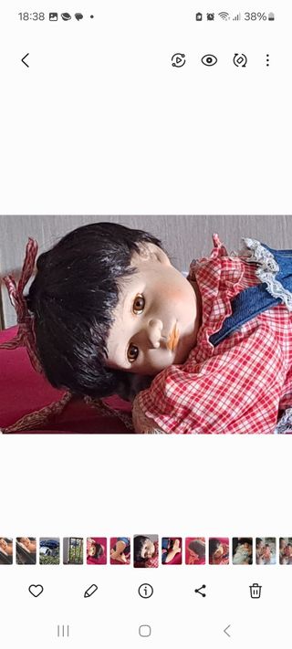 MUÑECA DE PORCELANA ANTIGUA TUMBADA