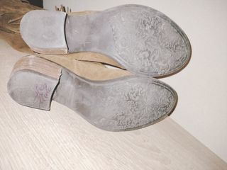 Botas altas flecos marrones