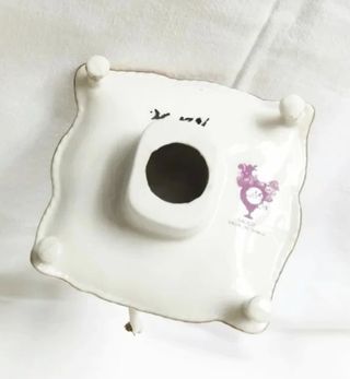 Figura niño porcelana y oro