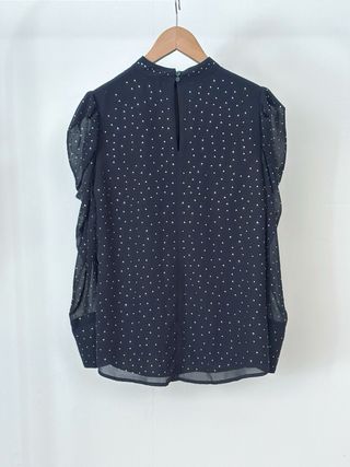 Blusa negra con brillantes