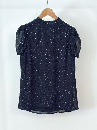 Blusa negra con brillantes