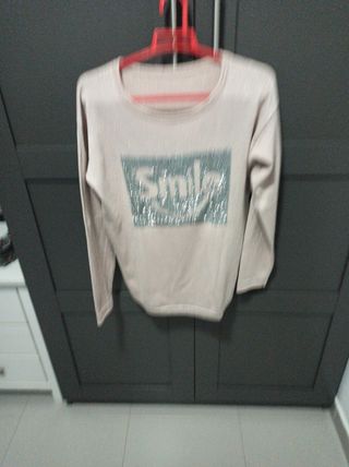 Jersey entretiempo talla M. 