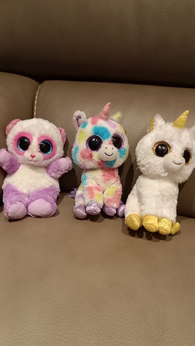 Tre peluche occhi grandi