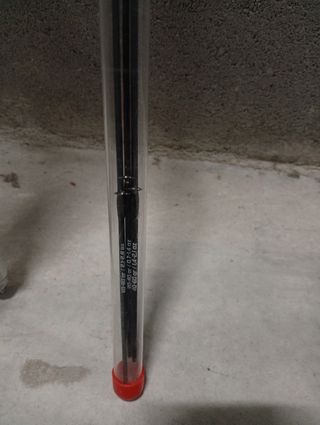 Caña de pesca y soporte de la marca Decathlon