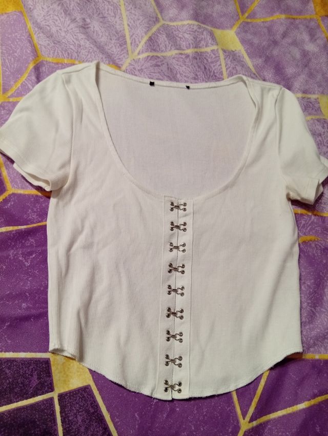 Top M corchetes blanco