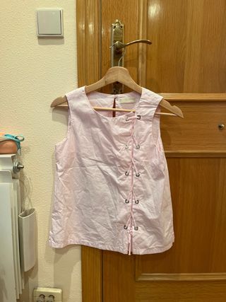 Blusa rosa sin mangas para niña