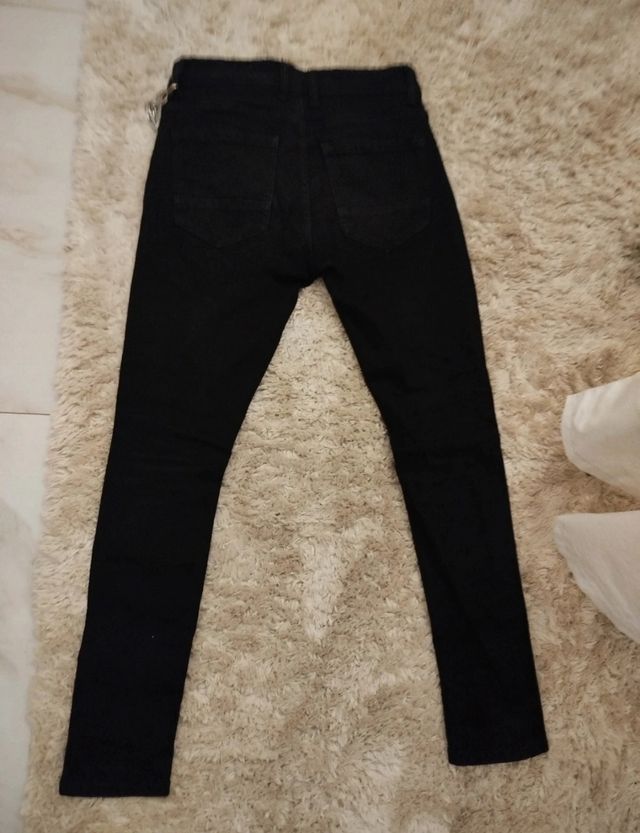 Pantalone con Catena