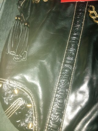 PRECIOSO bolso de Tous en piel negro .
