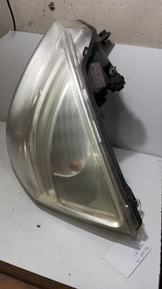 828200394706 faro izq Renault laguna III solo carc