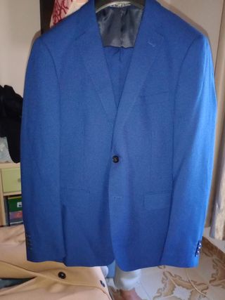 Traje