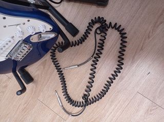 Guitarra eléctrica con amplificador