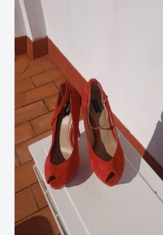 TACONES ROJOS