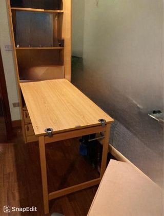 Armario con mesa plegable