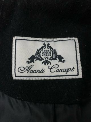 Giaccone nero linea sagomata