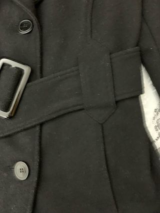 Giaccone nero linea sagomata